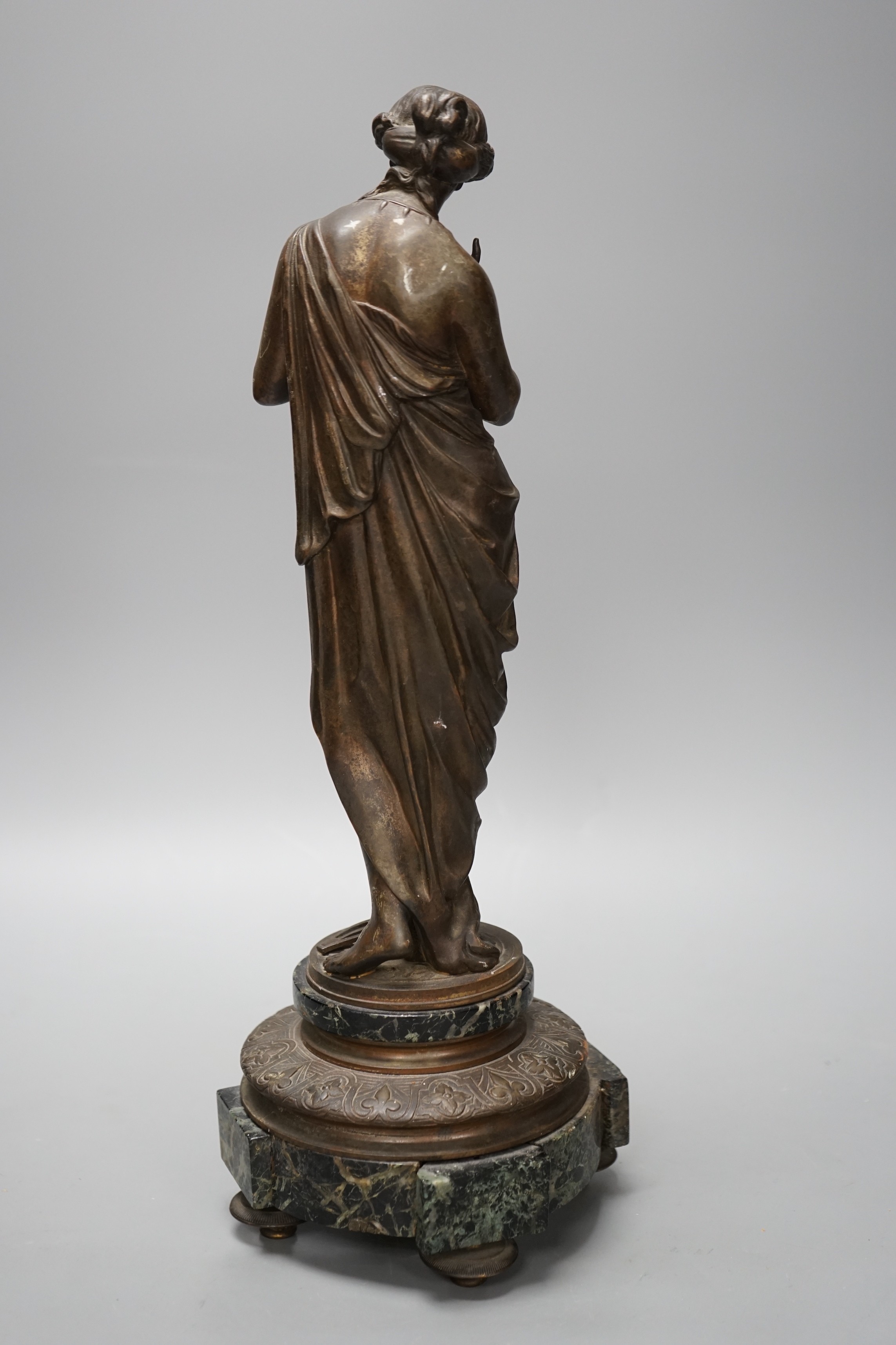 Émile Louis Picault (1833-1915), a bronze of a classical figure holding a butterfly, on marble base, 39cm